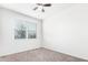 Bright bedroom with carpet flooring and window with blinds at 4725 W Orange Ave, Coolidge, AZ 85128