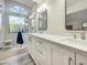 Modern bathroom with double vanity, a large shower, and a window at 5016 E Marconi Ave, Scottsdale, AZ 85254
