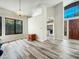 Bright dining area with wood-look tile floors and views of the backyard at 5016 E Marconi Ave, Scottsdale, AZ 85254