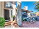 Inviting front entry with brick patio and small sitting area at 5444 E Kings Ave, Scottsdale, AZ 85254