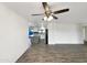 Open living room, hardwood floors, kitchen and pool view at 610 W Medina Ave, Mesa, AZ 85210