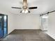 Main bedroom with pool view and barn door to the bathroom at 610 W Medina Ave, Mesa, AZ 85210