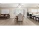 Bright dining area with table and chairs near kitchen at 7008 W Mitchell Dr, Phoenix, AZ 85033