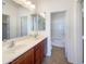 Bathroom with double vanity and a separate bathtub at 804 W Dana Dr, San Tan Valley, AZ 85143
