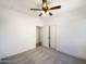 Bright bedroom with ceiling fan and spacious closet at 804 W Dana Dr, San Tan Valley, AZ 85143