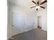 Well-lit bedroom with double door closet and neutral walls at 804 W Dana Dr, San Tan Valley, AZ 85143
