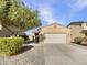 Single-story house with a two-car garage and landscaped front yard at 804 W Dana Dr, San Tan Valley, AZ 85143