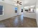 Open living area with tile floors and kitchen view at 804 W Dana Dr, San Tan Valley, AZ 85143