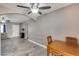 Bright dining area with wood-look floors and view into living room at 8109 E Madero Ave, Mesa, AZ 85209