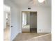 Spacious bedroom with mirrored closet doors and neutral walls at 8937 N 63Rd Dr, Glendale, AZ 85302