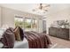 Spacious bedroom with window and dresser at 90 W Cottage Ln, Tempe, AZ 85282