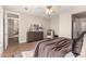Bedroom with a double bed, ceiling fan and dresser at 90 W Cottage Ln, Tempe, AZ 85282