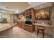 Well-equipped kitchen featuring granite countertops at 9212 E Whitethorn Cir, Scottsdale, AZ 85266