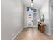 Bright entryway with herringbone floors and a console table at 933 E Piedmont Rd, Phoenix, AZ 85042