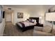 Spacious bedroom with a king-size bed and sitting area at 1040 E Osborn Rd # 1201, Phoenix, AZ 85014