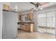 Kitchen with wood cabinets, granite counters and appliances at 14228 N Sierra Dawn Way, Sun City, AZ 85351