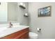 Modern bathroom featuring a floating vanity and stylish decor at 17826 W Straight Arrow Ln, Surprise, AZ 85387