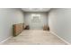 Empty bonus room with wood-look tile flooring at 17826 W Straight Arrow Ln, Surprise, AZ 85387