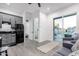 Small galley kitchen with gray cabinets and retro fridge at 18233 W Palo Verde Ct, Litchfield Park, AZ 85340