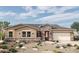 Single-story home with stone accents and desert landscaping at 20241 W San Miguel Ave, Litchfield Park, AZ 85340
