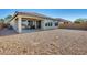 Large backyard with gravel covering and covered patio area at 21686 N 259Th Dr, Buckeye, AZ 85396