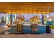 Outdoor grilling area with two built-in grills under a pergola at 3131 N Central Ave # 5022, Phoenix, AZ 85012