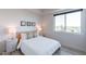Cozy bedroom with unique decor and city views at 3131 N Central Ave # 5022, Phoenix, AZ 85012