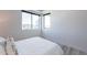 Bedroom with a queen bed and large windows offering city views at 3131 N Central Ave # 5022, Phoenix, AZ 85012