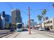 Light rail runs through the city with modern buildings at 3131 N Central Ave # 5022, Phoenix, AZ 85012