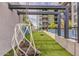 Relaxing community courtyard with hanging chair and putting green at 3131 N Central Ave # 5022, Phoenix, AZ 85012