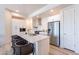 Modern kitchen with stainless steel appliances and white cabinetry at 3131 N Central Ave # 5022, Phoenix, AZ 85012
