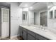 Modern bathroom with dual vanity sinks and updated fixtures at 3315 E Hampton Ave, Mesa, AZ 85204