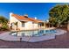 Inviting kidney-shaped pool with a large patio area at 3315 E Hampton Ave, Mesa, AZ 85204