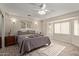 Well-lit bedroom with wood floors and ceiling fan at 333 N 58Th St, Mesa, AZ 85205