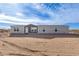 Single-story home with neutral siding and landscaping at 35041 W Euclid Ave, Tonopah, AZ 85354