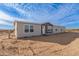 Single-story home with neutral siding and landscaping at 35041 W Euclid Ave, Tonopah, AZ 85354
