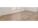 Spacious living room with hardwood floors and neutral walls at 35041 W Euclid Ave, Tonopah, AZ 85354