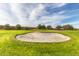 View of a sand trap on a lush green golf course at 390 S Verdad Ln, Casa Grande, AZ 85194