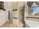 Spa-like bathroom featuring a large shower and soaking tub at 4055 N Recker Rd # 88, Mesa, AZ 85215