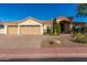 Beautiful two-story home with a three-car garage and desert landscaping at 4055 N Recker Rd # 88, Mesa, AZ 85215