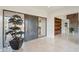 Elegant entryway with a large wood door and tile floors at 41621 N 54Th St, Cave Creek, AZ 85331