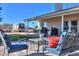 Comfortable patio seating area with cushions and side table at 50209 W Gail Ln, Maricopa, AZ 85139