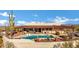 Luxury pool with patio and outdoor seating area; mountain views at 50811 N 295Th Ave, Wickenburg, AZ 85390