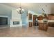 Spacious kitchen featuring dark wood cabinets, granite counters, and stainless steel appliances at 669 E Linda Ln, Gilbert, AZ 85234