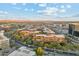 Aerial view of a modern condo community with mountain views at 7117 E Rancho Vista Dr # 3004, Scottsdale, AZ 85251