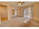 Bedroom with carpeted flooring, sliding door to balcony at 8961 W Century Dr, Arizona City, AZ 85123