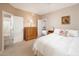 Bright bedroom with ample space and view into living room at 9151 W Greenway Rd # 243, Peoria, AZ 85381