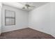 Bright bedroom featuring neutral carpet and window at 931 W Cedar Tree Dr, San Tan Valley, AZ 85143