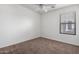 Simple bedroom with neutral wall and carpet at 931 W Cedar Tree Dr, San Tan Valley, AZ 85143