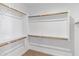 Spacious walk-in closet with ample shelving and hanging space at 9446 W Sells Dr, Phoenix, AZ 85037